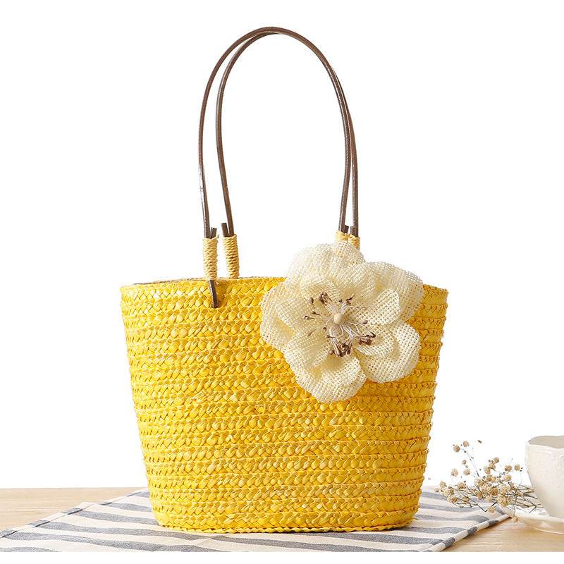Beach bag with decorative flower detail embellishment Bowlift