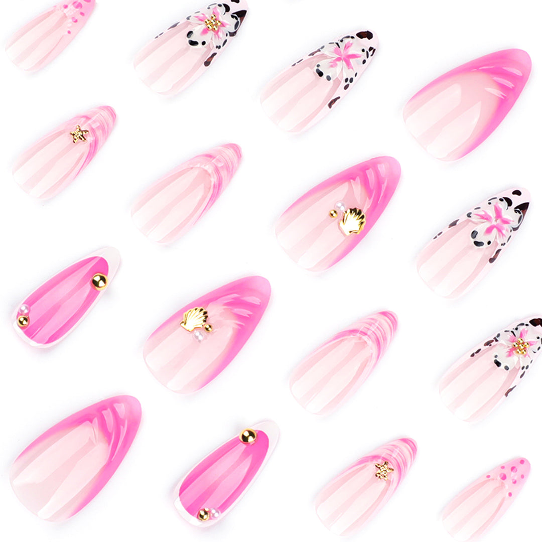 Artistic nail extensions with floral accents and glitter Bowlift