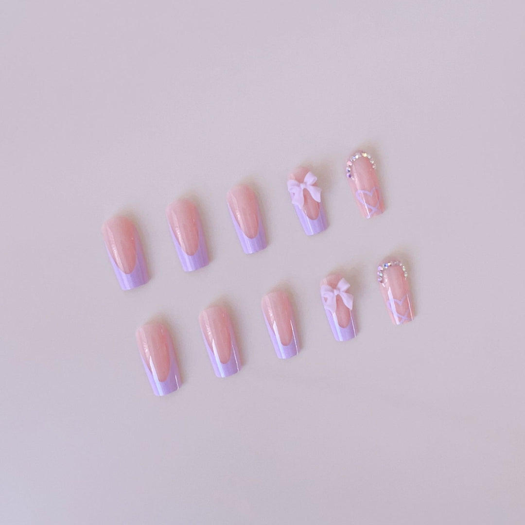 Artificial nail set with elegant 3D bows and glitter details Bowlift