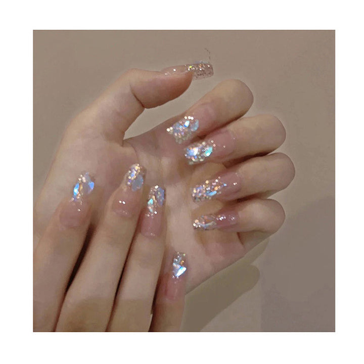 Glamorous nail art with holographic accents Bowlift