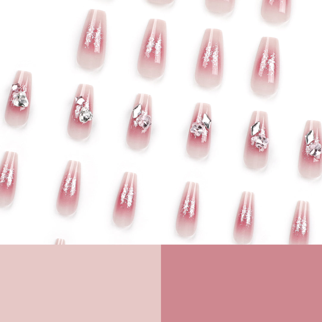 Glamorous artificial nails with glitter and crystal embellishment Bowlift