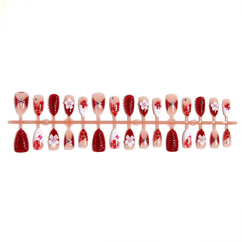 Luxury designed artificial nails with flower accents Bowlift