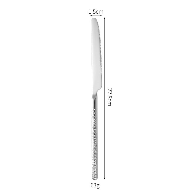 Elegant dessert spoon with elaborate handle design Bowlift