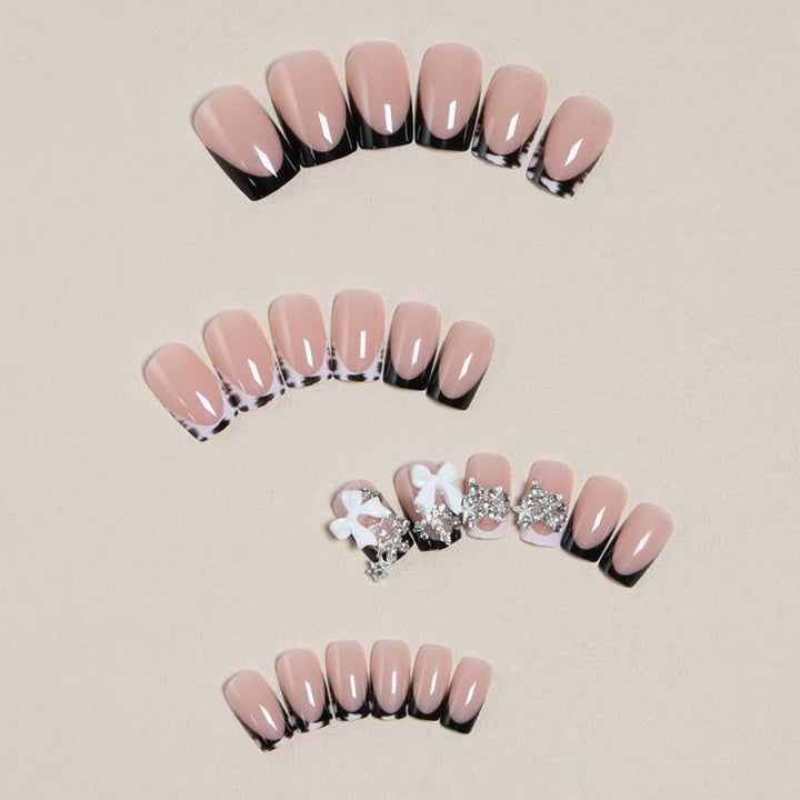 Elegant artificial nails with detailed embellishments Bowlift
