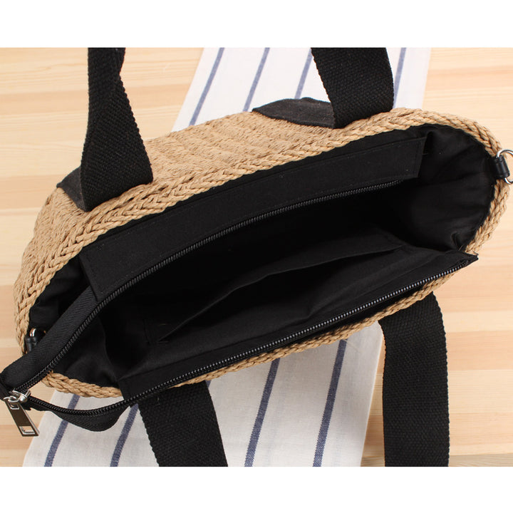 Handbag made of braided natural material with adjustable shoulder strap Bowlift