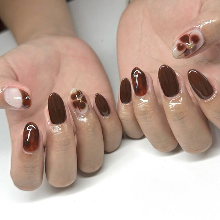Artful Nail Extensions with Elegant Floral and Glossy Design Bowlift