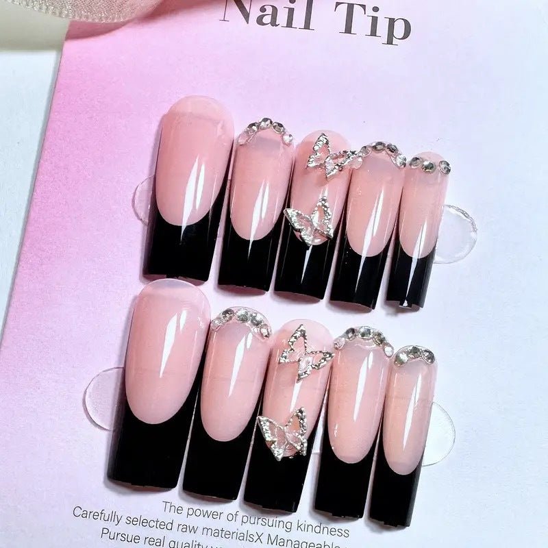Trendy artificial nails with delicate rhinestone and butterfly accents Bowlift