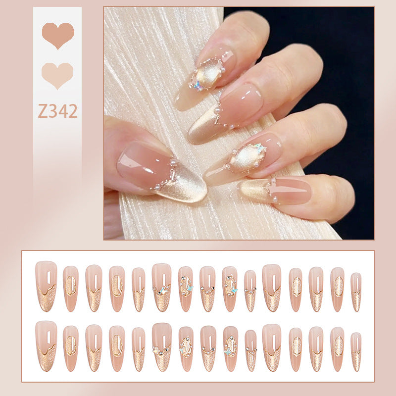 Art nail set with elegant gold glitter design Bowlift