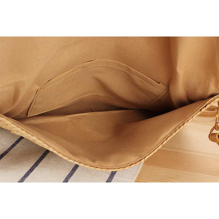 Shoulder bag made of braided natural material with original wave pattern Bowlift