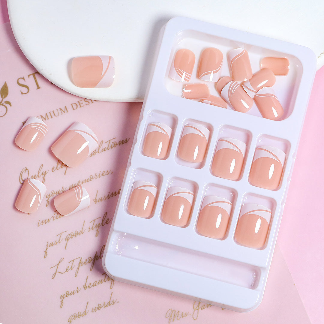 Artificial nail set with elegant French nail design and modern lines Bowlift