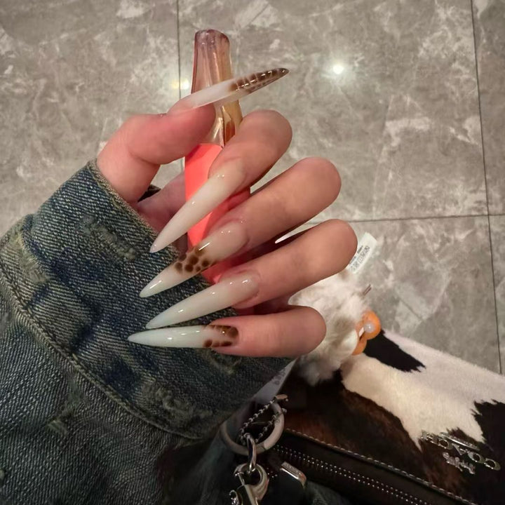 Artistic Long Stiletto Nail Enhancements Bowlift