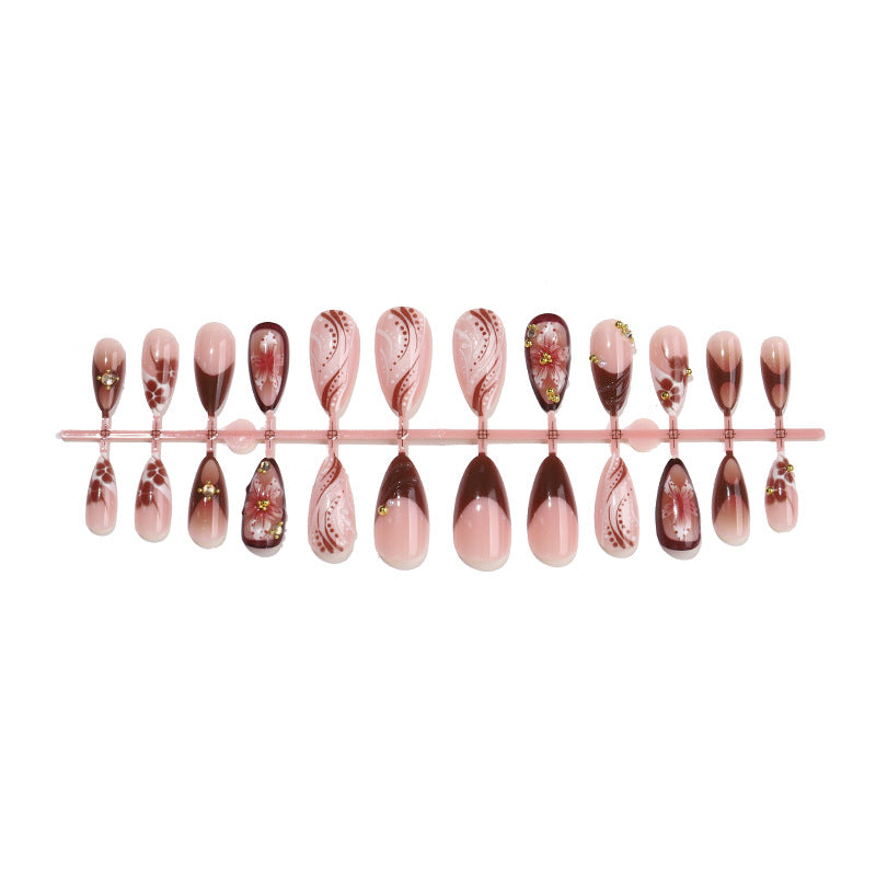 Decorative Press-On Nail Set with Intricate Floral and Ombre Design Bowlift