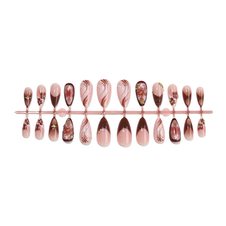 Decorative Press-On Nail Set with Intricate Floral and Ombre Design Bowlift