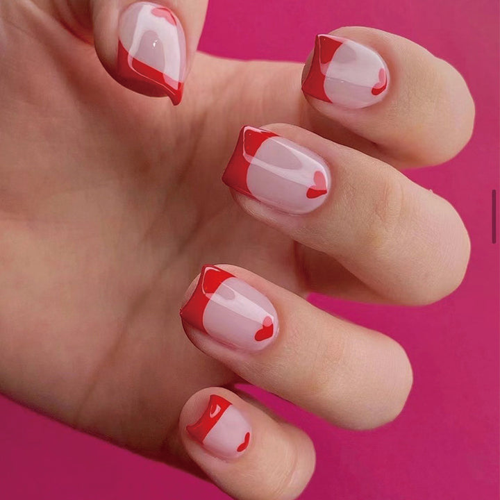 Artistic Nail Extensions with Heart Pattern Bowlift