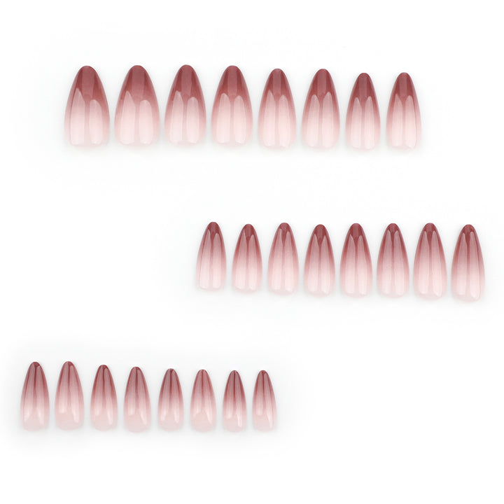 Artistic stiletto nails with elegant ombre design Bowlift