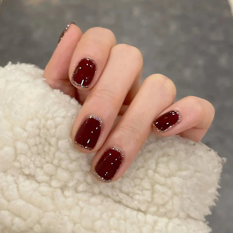 Artificial nails with heart accent and glamorous decorations Bowlift