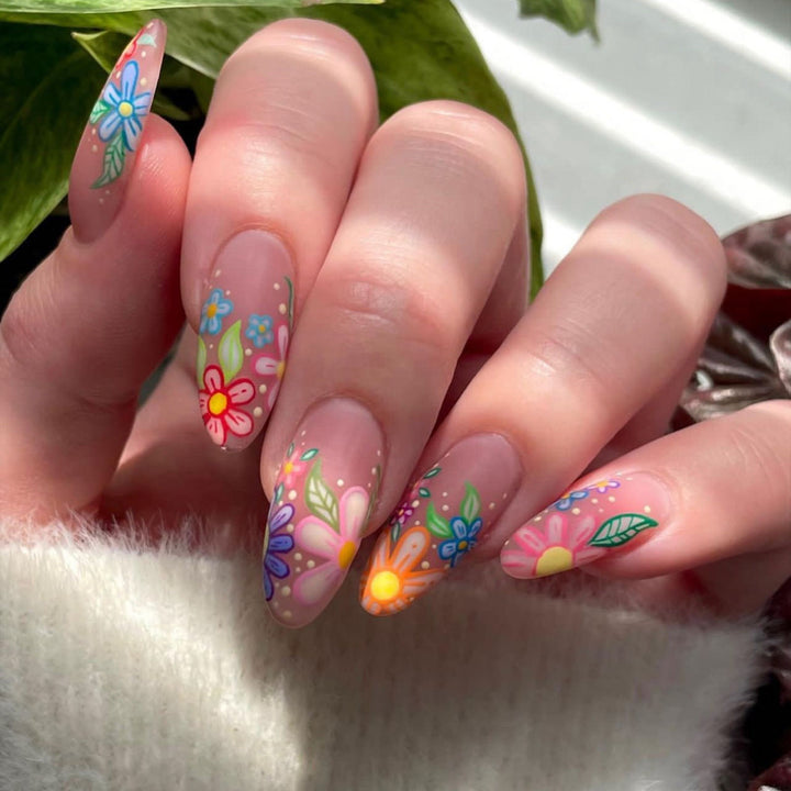 Nail art set with colorful flower designs Bowlift