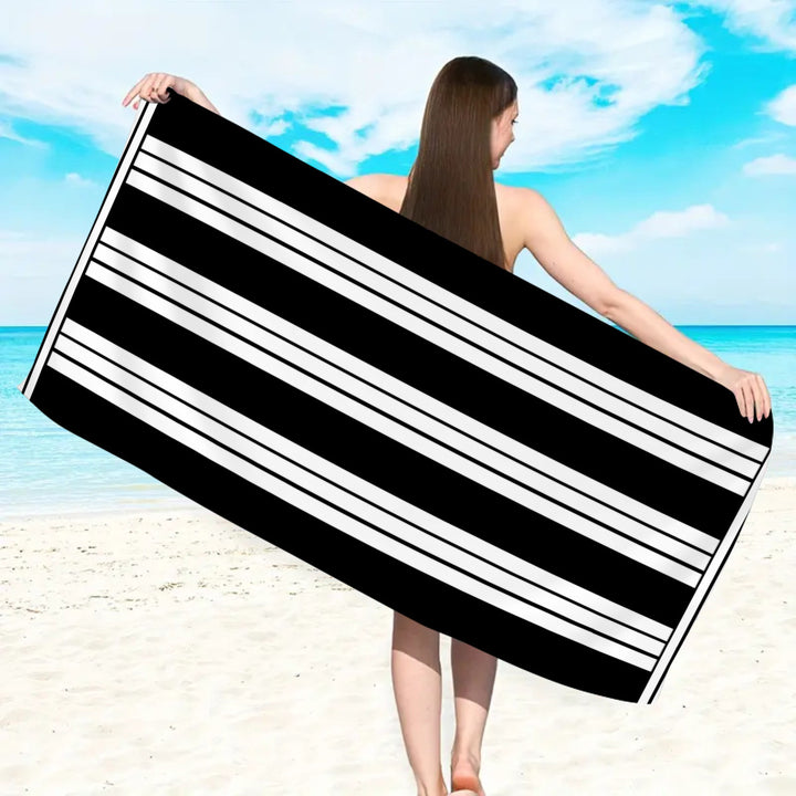 large and soft beach towel with striped pattern Bowlift