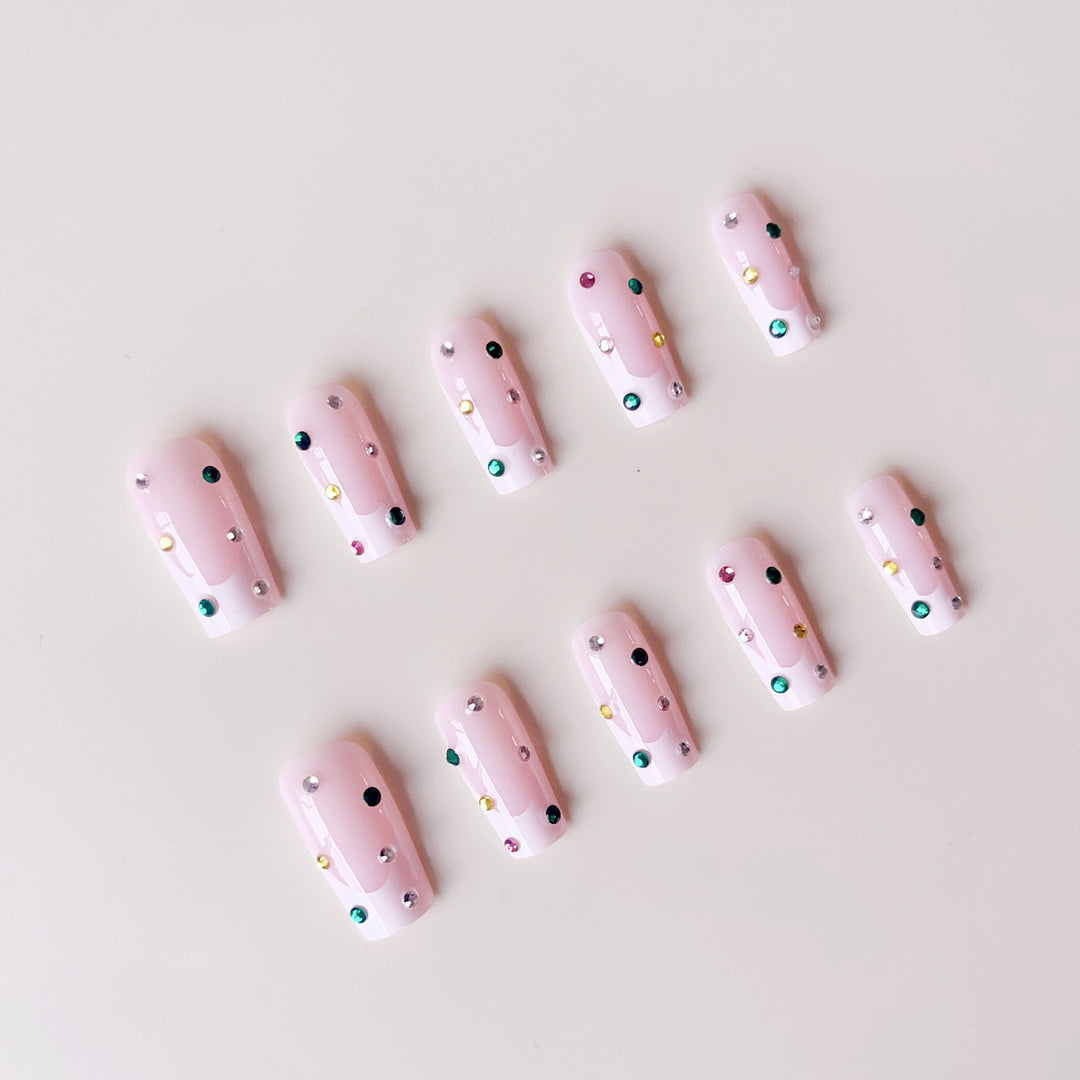Artificial nail set with sparkling rhinestone accents and elegant details Bowlift