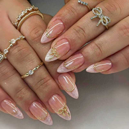 Artistic Pointed Press-On Nails with Gold Accents Bowlift