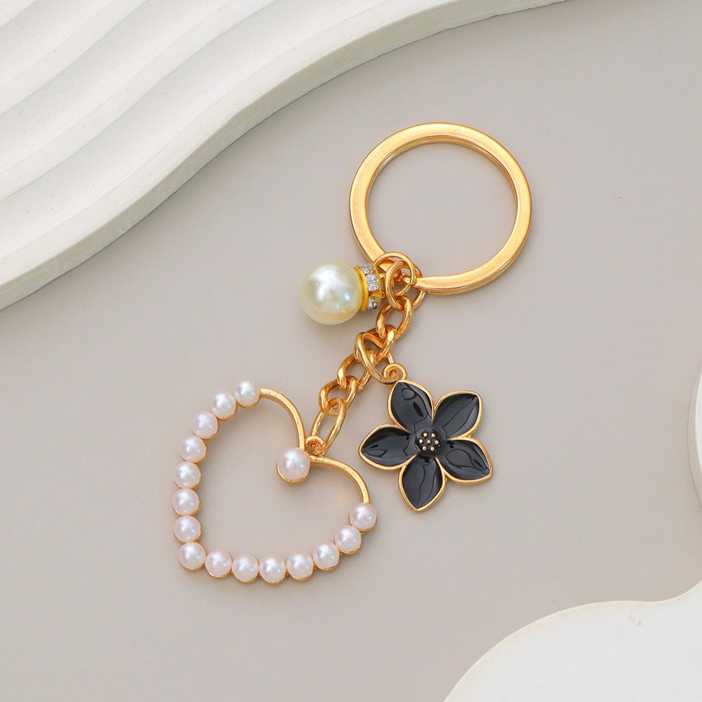 Keychain with heart and flower motif Bowlift