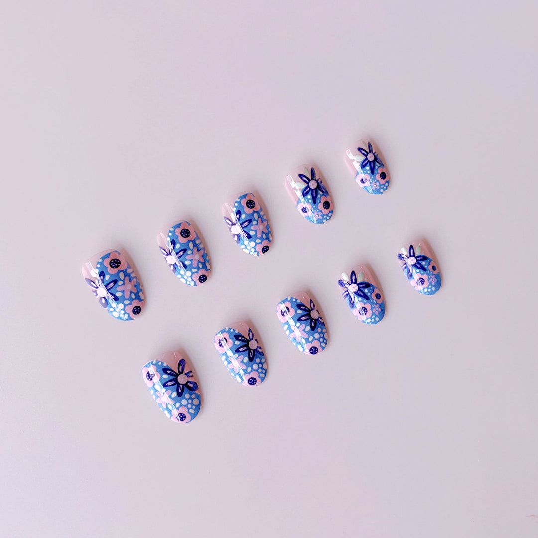 Nail art set with floral accents and vibrant patterns Bowlift