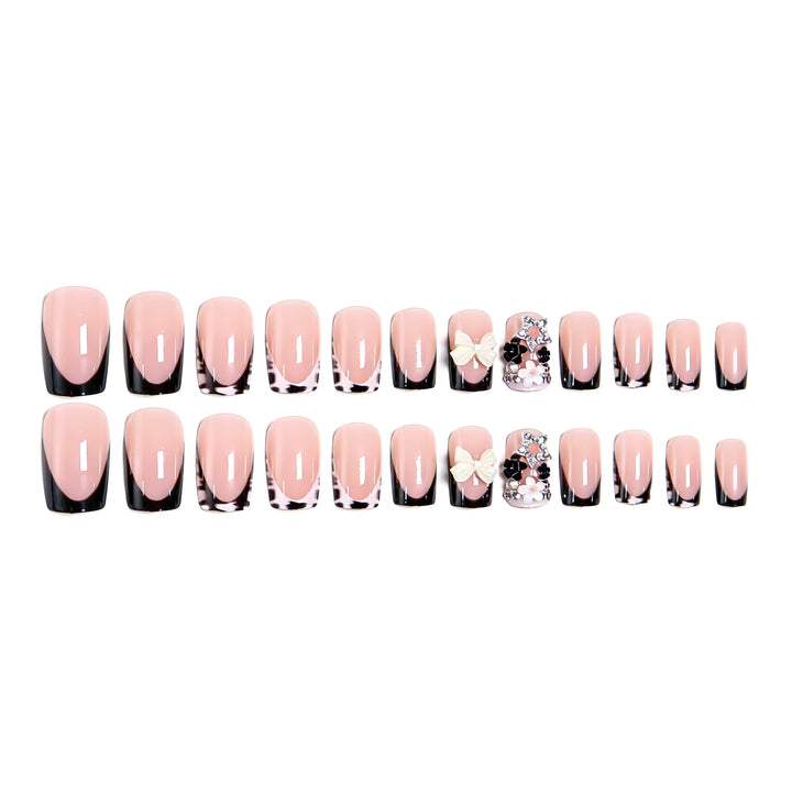 Artificial nail design with elaborate 3D decorations Bowlift