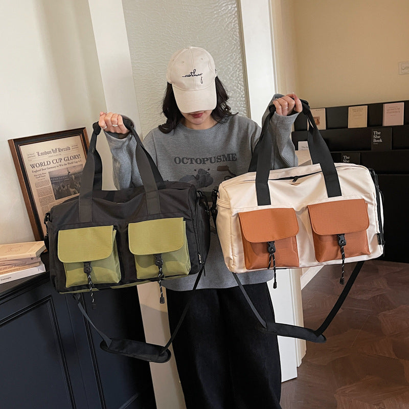 Multifunctional tote bag with comfortable shoulder padding and numerous outer pockets Bowlift