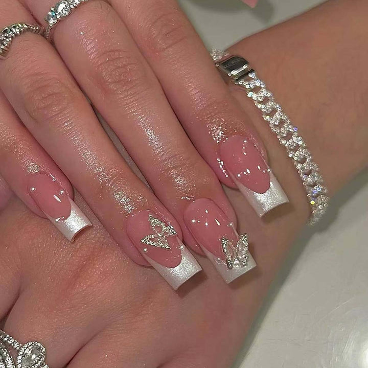 Creative French nails with glitter accents Bowlift