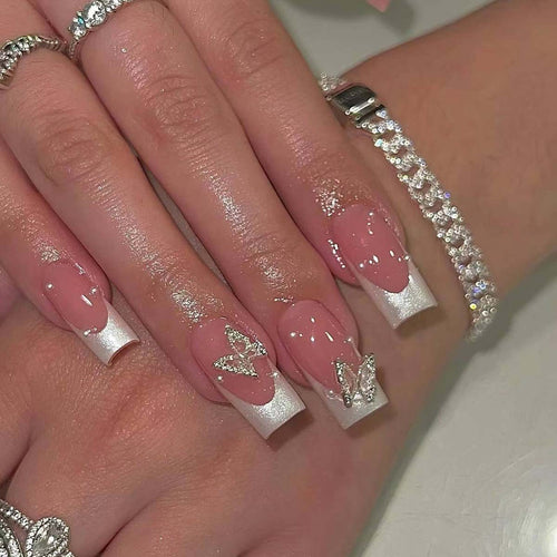 Creative French nails with glitter accents Bowlift