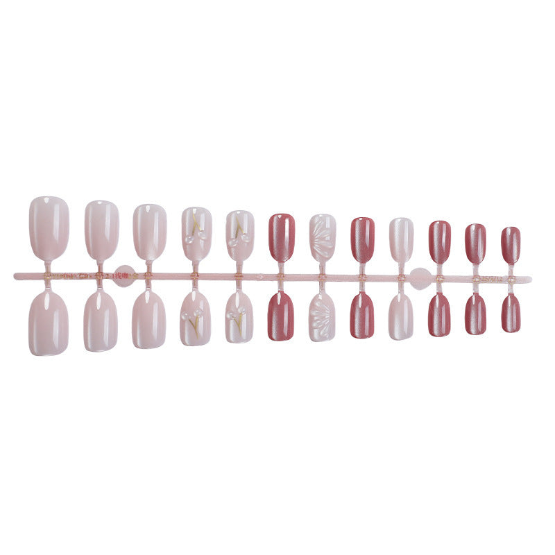 Acrylic nail set with elegant high-gloss finish and creative embellishments Bowlift