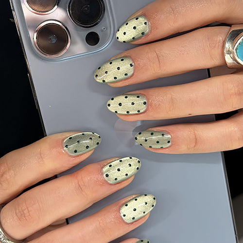 Creative Nail Art with Polka Dot Pattern Bowlift