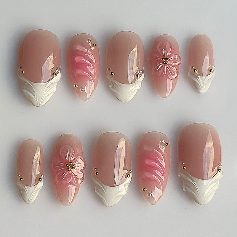 Nail set with luxurious flower and glitter accents Bowlift