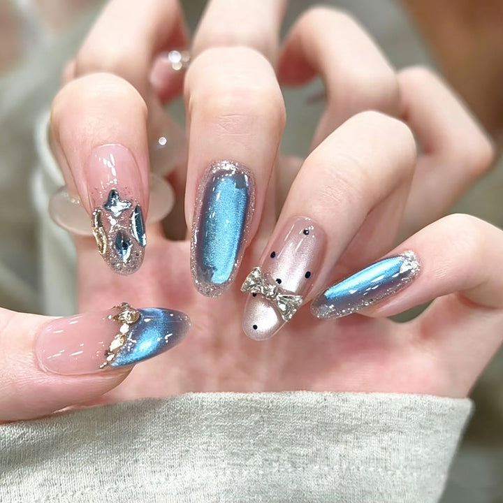Art nails in elegant premium design with rhinestone and glitter elements Bowlift