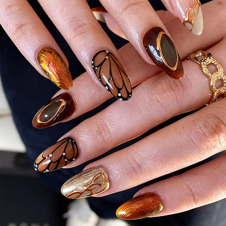 Artificial nail set with elegant gold and black design Bowlift