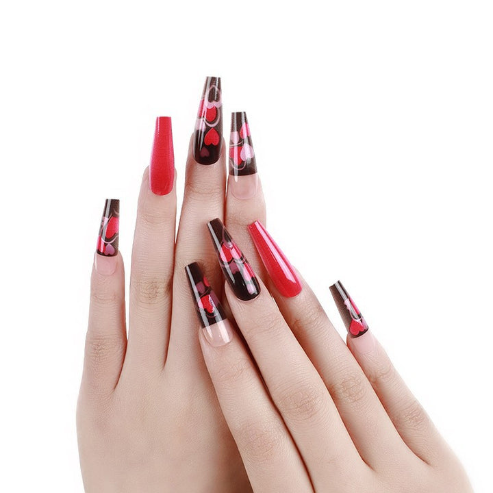 Fake nails in an eye-catching heart design Bowlift