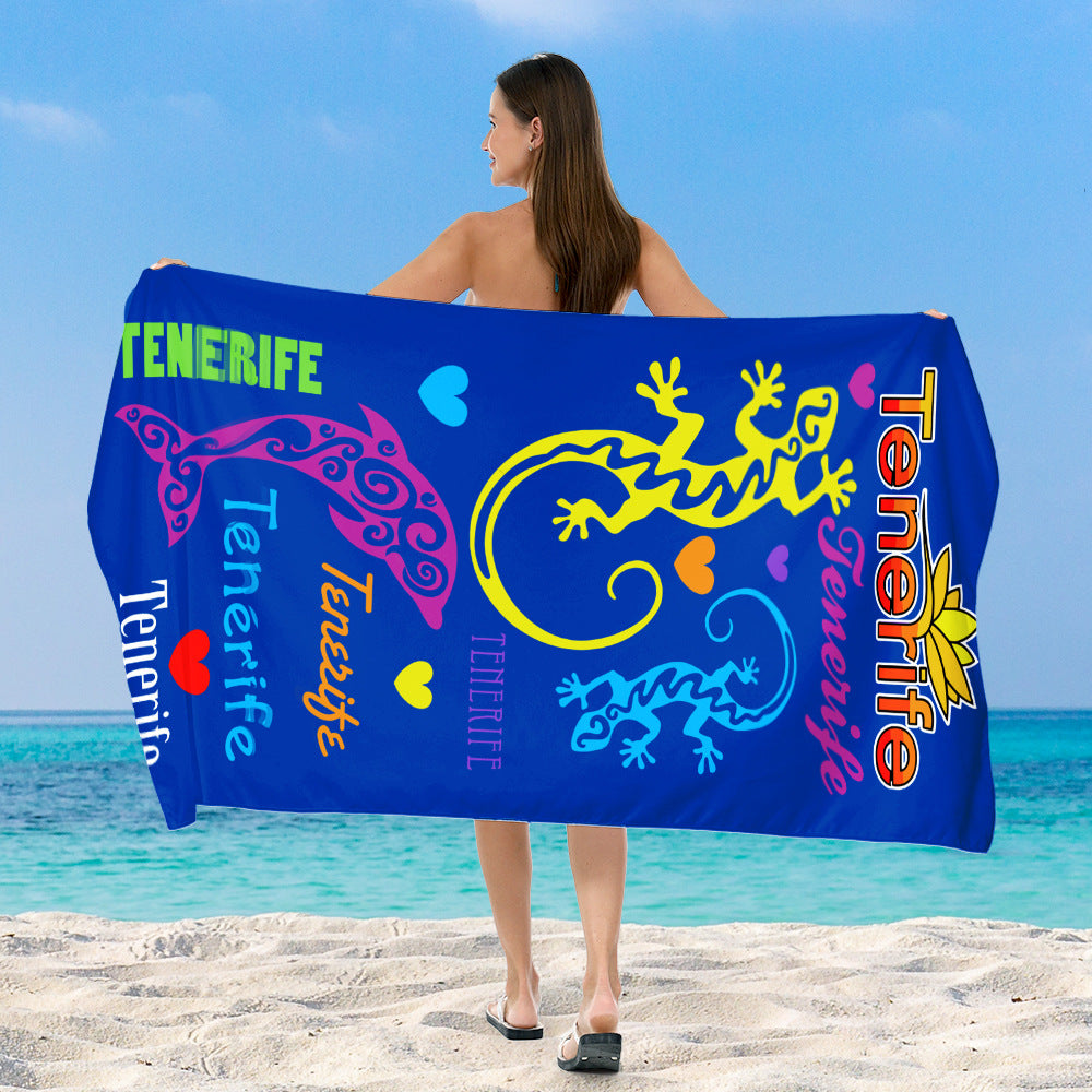 Beach towel with vibrant, colorful animal motif Bowlift