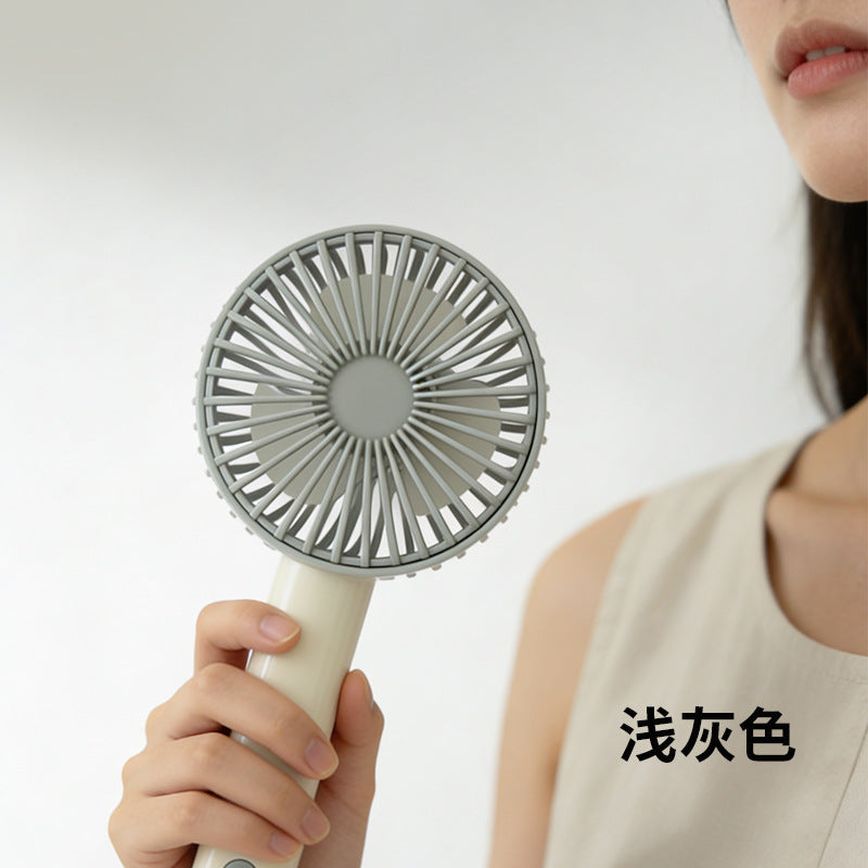 Women's portable handheld fan with ergonomic grip and powerful battery technology Bowlift