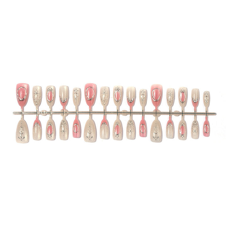 Artificial nail set with glamorous floral and metallic accents Bowlift