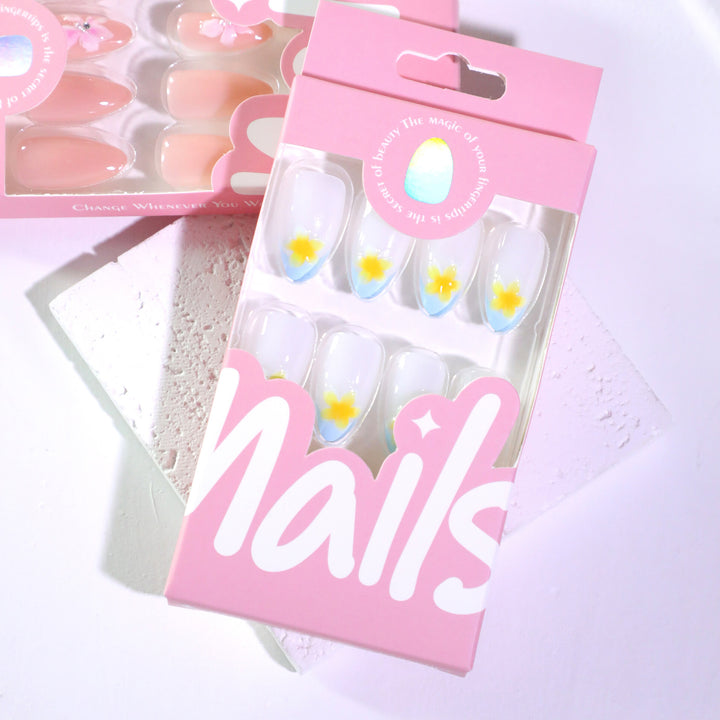 Artfully designed nail extensions with floral accent Bowlift