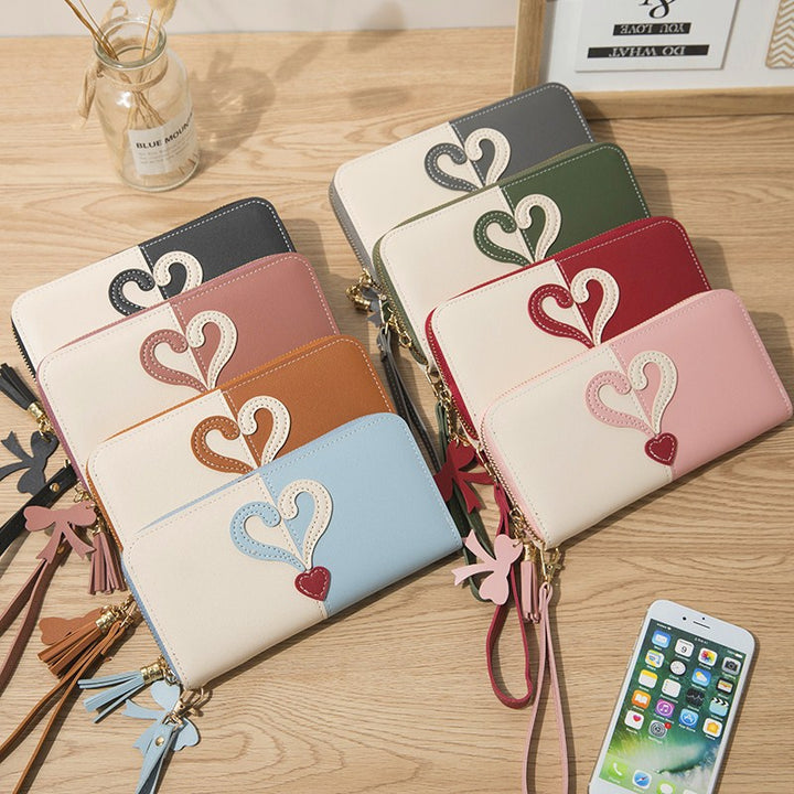 Stylish wallet with heart appliqués Bowlift