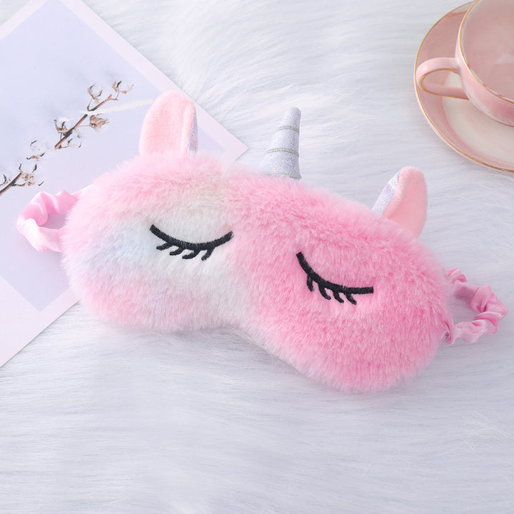 Women's plush-filled unicorn sleep mask with 3D horn, embroidered eyelashes and adjustable satin band Bowlift