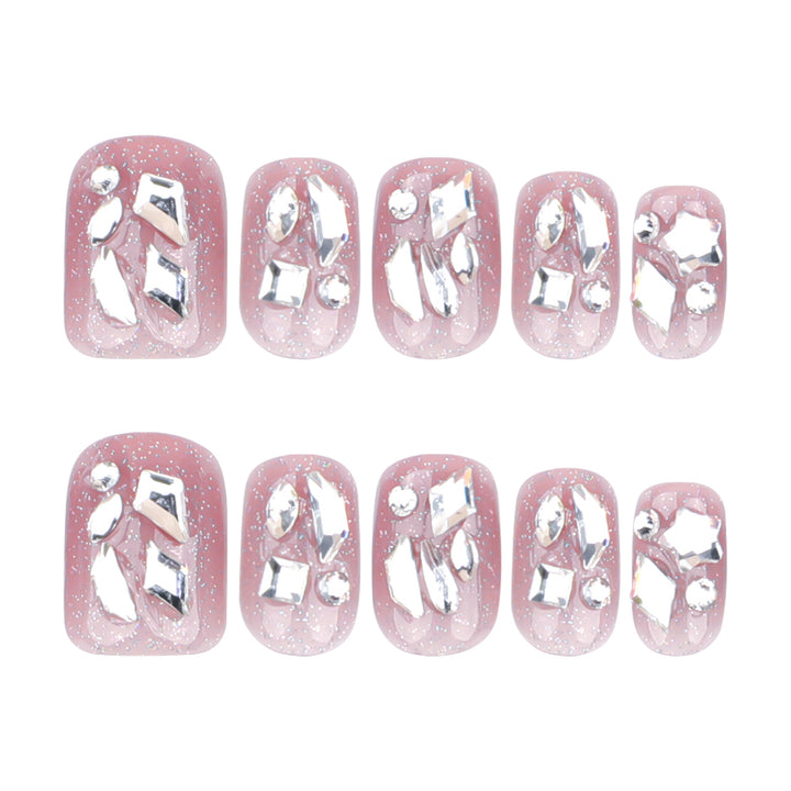 Artificial nail art with glamorous glitter accents Bowlift