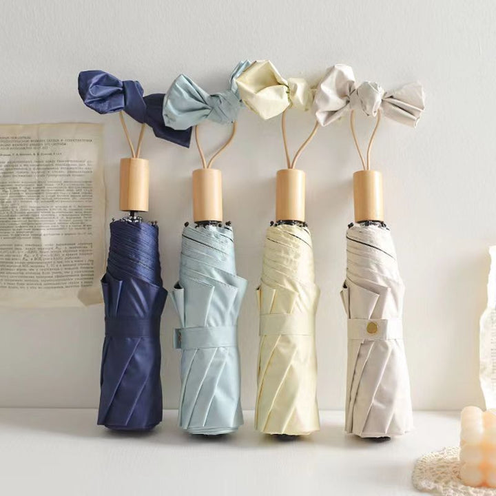 Women's elegant folding umbrella with innovative design Bowlift