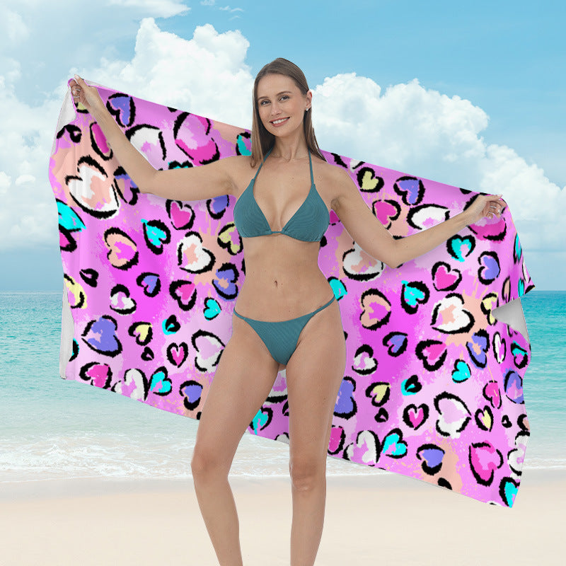 Beach towel with vibrant tropical plant motif Bowlift