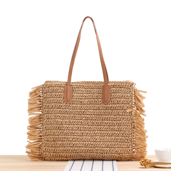 Beach bag with fringes and sturdy leather handles Bowlift