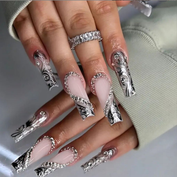 Elegant artificial nails with stylish embellishments Bowlift