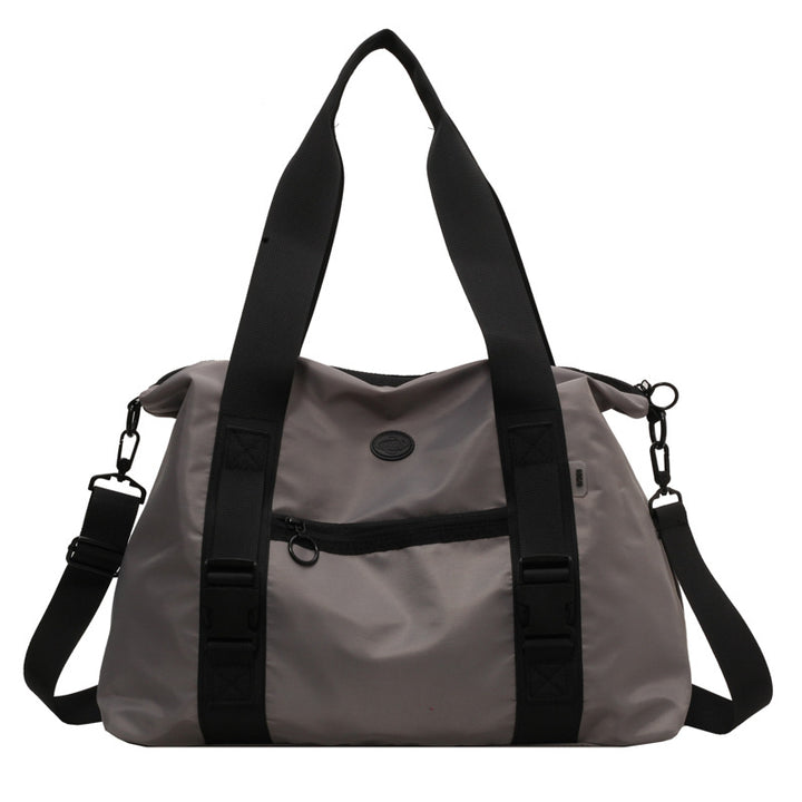 Spacious sports duffel bag with ergonomic carrying handles and water-repellent material Bowlift