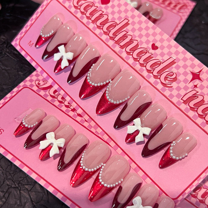 Artificial acrylic nails with detailed floral accents Bowlift