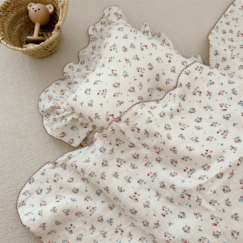 Unisex Muslin Blanket with delicate floral design and elegant ruffles Bowlift